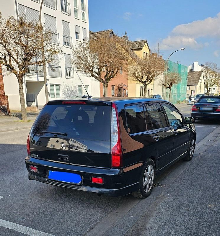 Gebraucht Mitsubishi Lancer 101 PS (74 kW) 2006 Schwarz Kombi