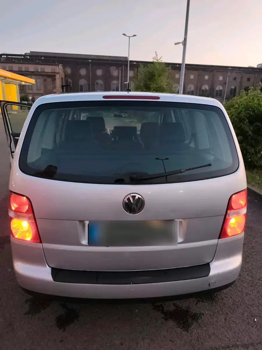 Używany VW Touran 105 KM (77 kW) 2005 Srebrny Minivan