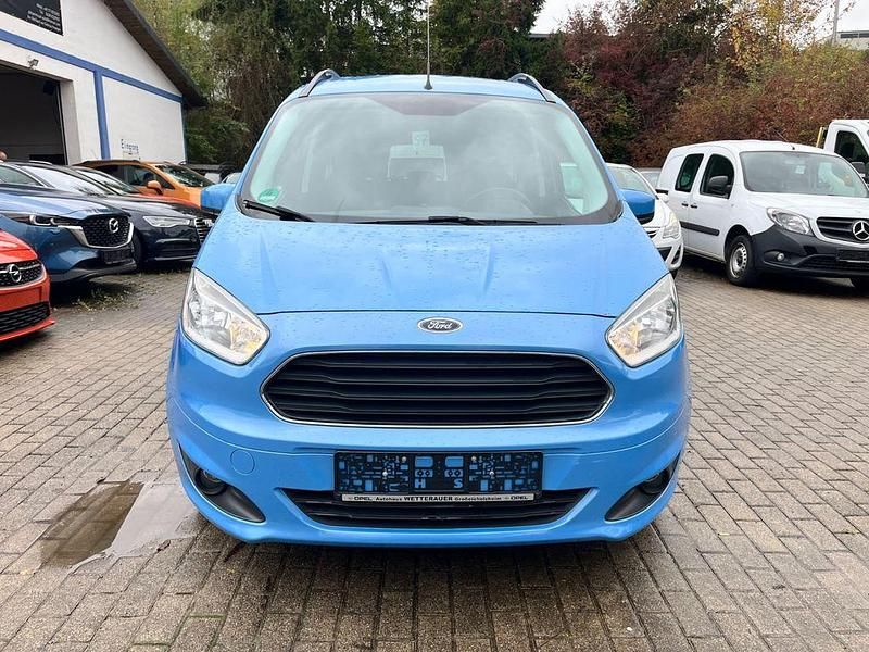 Blau Gebraucht 2015 Ford Tourneo Courier Titanium Van / Kleinbus | 7.999 € (Guter Preis) - Bild 1/4