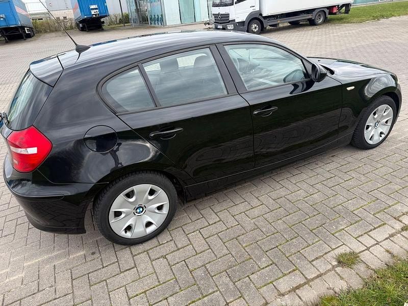 Second-hand BMW 116 116 CP (85 kW) 2010 Negru Hatchback