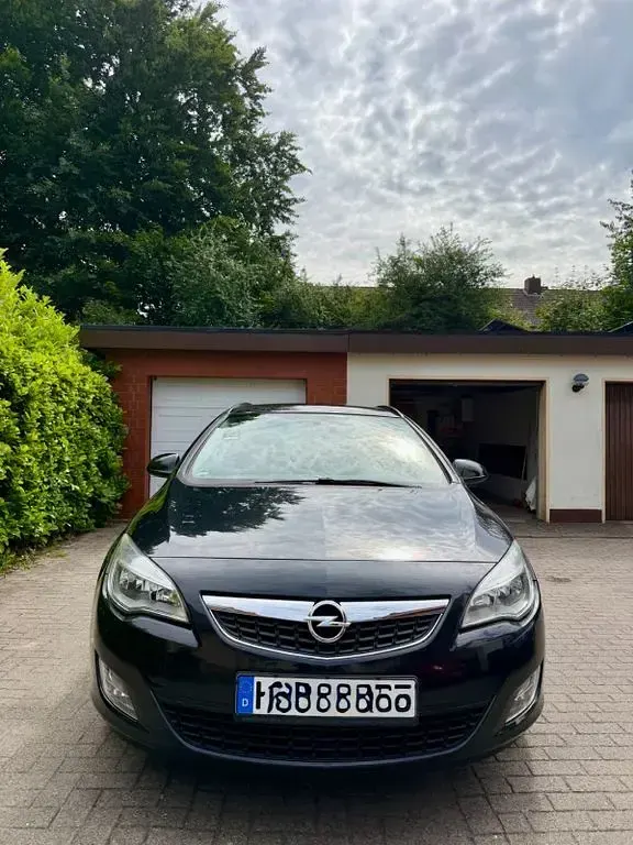 Gebraucht Opel Astra Edition 101 PS (74 kW) 2011 Schwarz Kombi