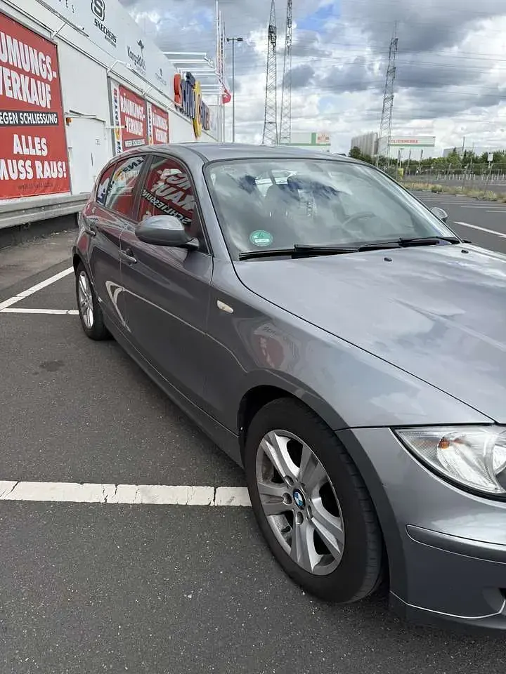 Gebraucht BMW 116 122 PS (89 kW) 2009 Grau Kleinwagen