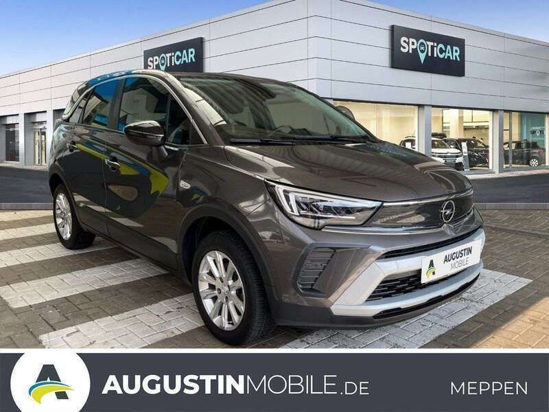 Mondstein grau/e:vulkan grau Gebraucht 2021 Opel Crossland X Elegance SUV | 17.950 € (Fairer Preis) - Bild 1/4