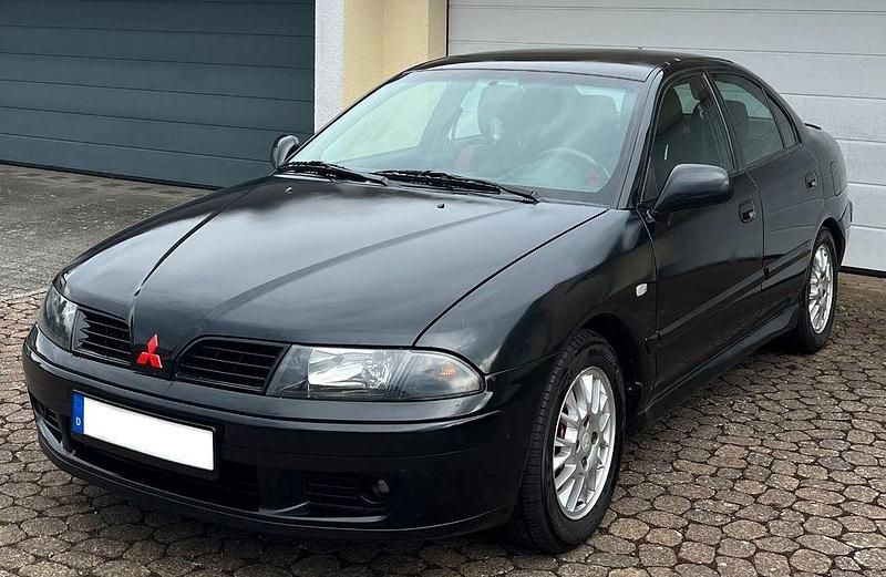 Schwarz Gebraucht 2004 Mitsubishi Carisma Limousine | 2.490 € (Etwas zu teuer) - Bild 1/4