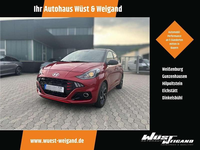 Dragon red/ phantom black / mi Gebraucht 2025 Hyundai i10 N Line Kleinwagen | 19.777 € (Fairer Preis) - Bild 1/4