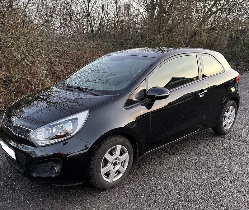 Schwarz Gebraucht 2012 Kia Rio Spirit Kleinwagen | 5.790 € (Fairer Preis) - Bild 1/4