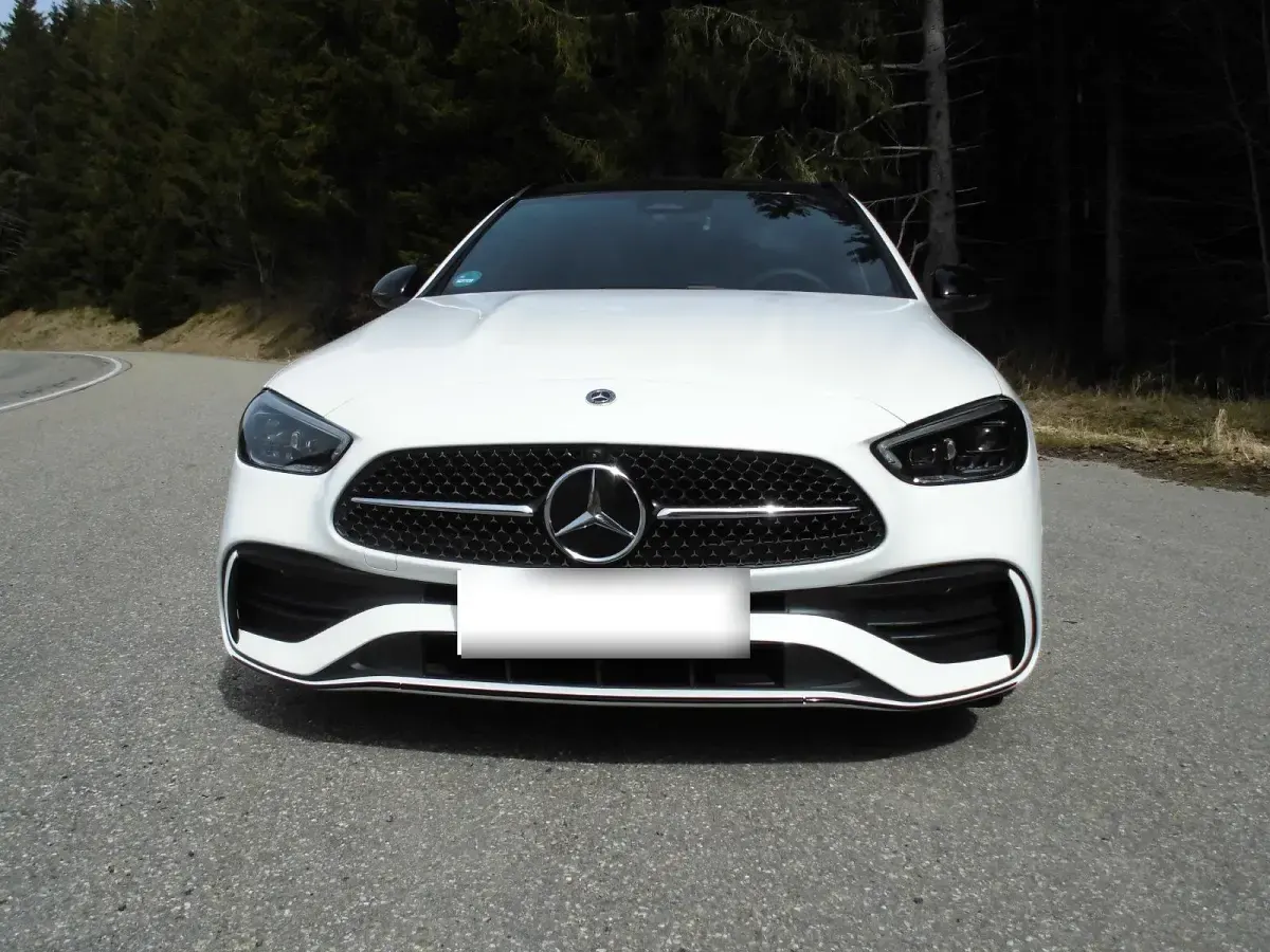 Gebraucht Mercedes C180 AMG 170 PS (125 kW) 2024 Weiß Kombi