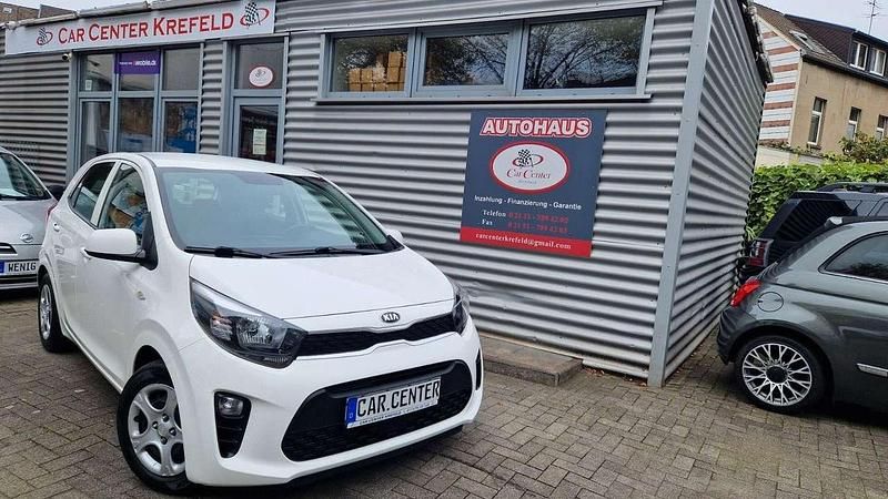 (ud)clear white Gebraucht 2020 Kia Picanto Kleinwagen | 8.500 € (Fairer Preis) - Bild 1/4
