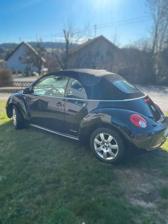 Gebraucht VW New Beetle Freestyle 105 PS (77 kW) 2010 Schwarz Kleinwagen