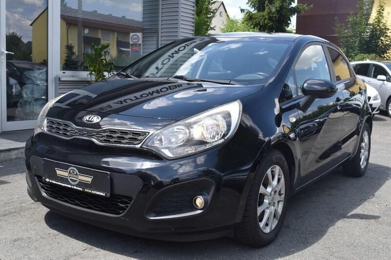 Schwarz Gebraucht 2014 Kia Rio DREAM-TEAM Edition Kleinwagen | 6.900 € (Fairer Preis) - Bild 1/4