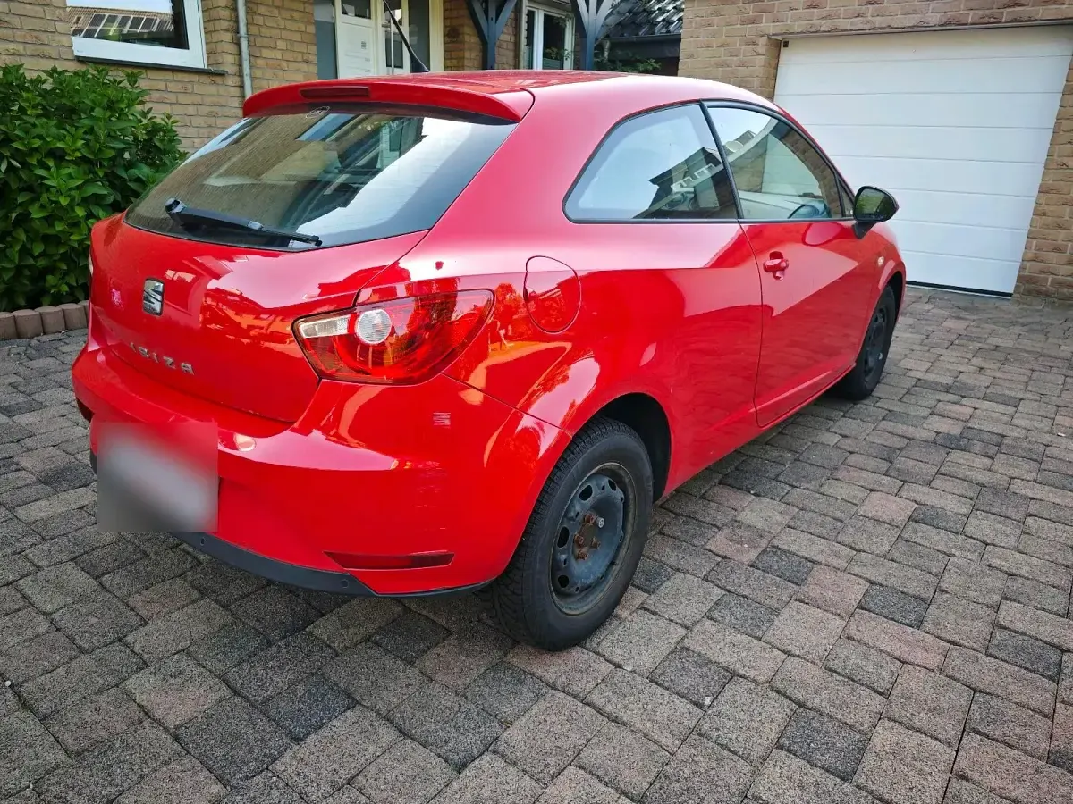 Używany Seat Ibiza 70 KM (51 kW) 2014 Czerwony Hatchback