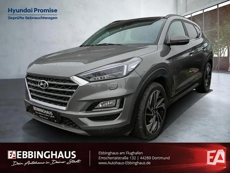 Olivine grey (grau) Gebraucht 2020 Hyundai Tucson Premium SUV | 24.990 € (Fairer Preis) - Bild 1/1