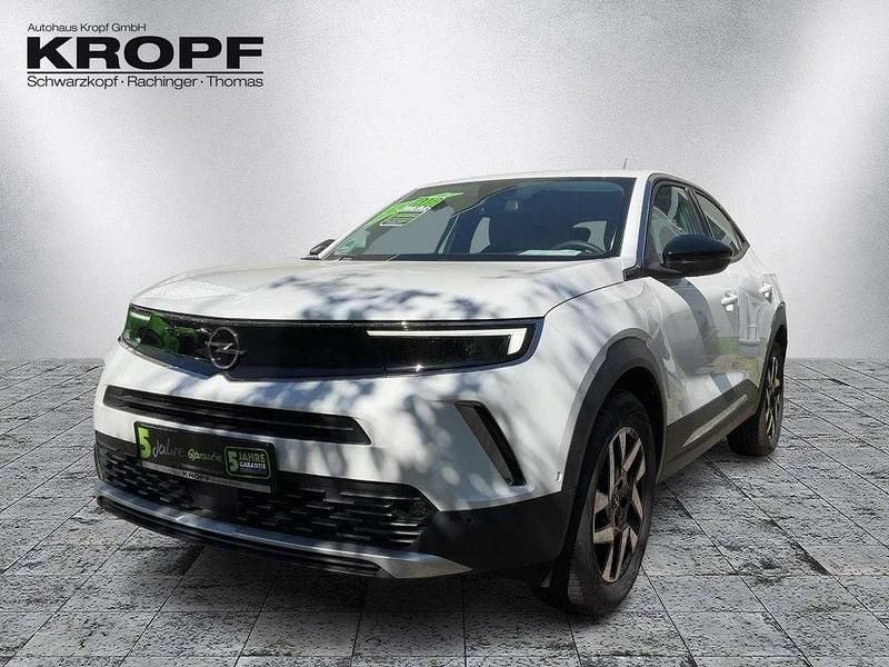Gebraucht Opel Mokka-e Elegance 100 kW (136 PS) 2023 Lack weiss banquise SUV