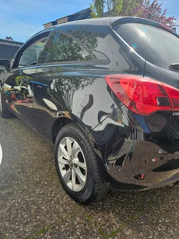 Używany Opel Corsa Active 101 KM (74 kW) 2016 Czarny Hatchback