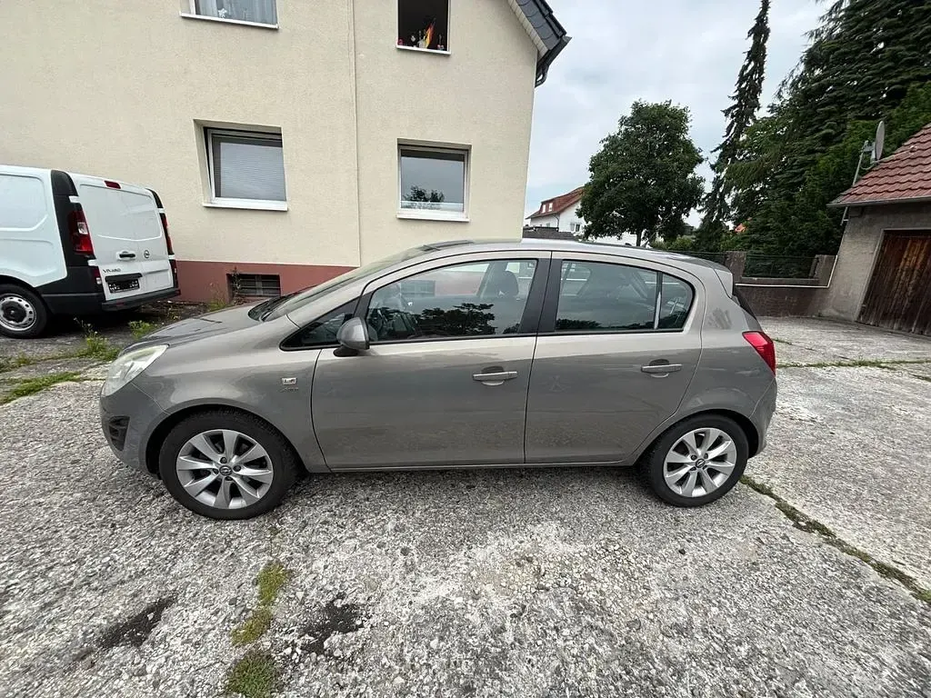 Gebraucht Opel Corsa Active 69 PS (50 kW) 2013 Grau Kleinwagen