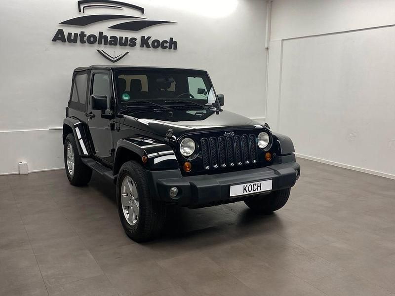 Schwarz Gebraucht 2012 Jeep Wrangler Unlimited Sahara SUV | 25.900 € (Fairer Preis) - Bild 1/4