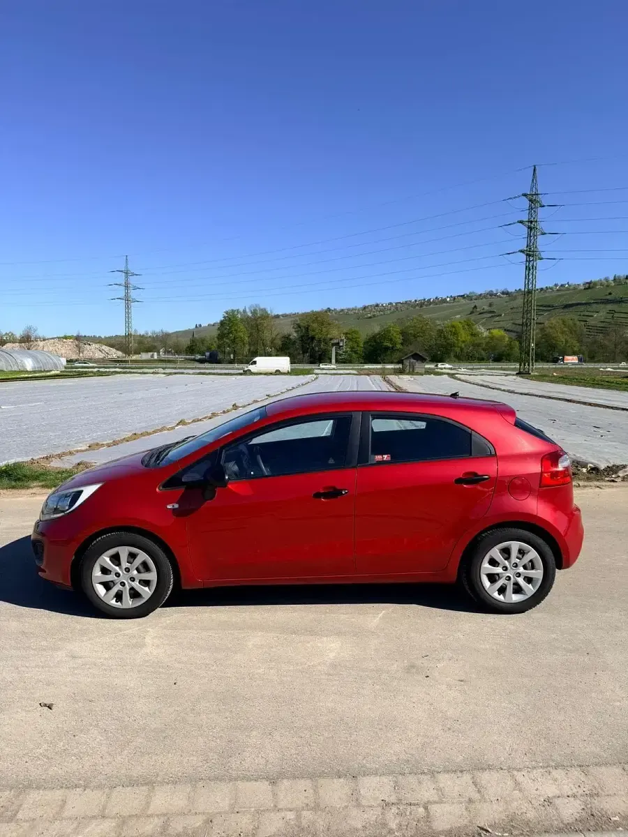 Gebraucht Kia Rio 86 PS (63 kW) 2012 Rot Kleinwagen