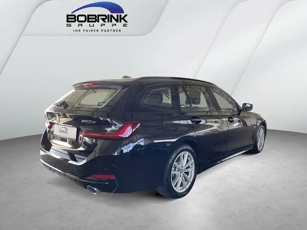 Gebraucht BMW 320e 204 PS (150 kW) 2023 Schwarz Kombi