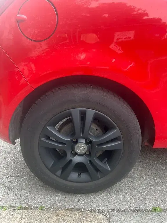 Gebraucht Opel Corsa Color Edition 101 PS (74 kW) 2011 Rot Kleinwagen