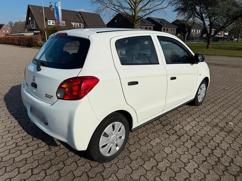 Gebraucht Mitsubishi Space Star Diamant Edition 71 PS (52 kW) 2015 Weiß Kleinwagen