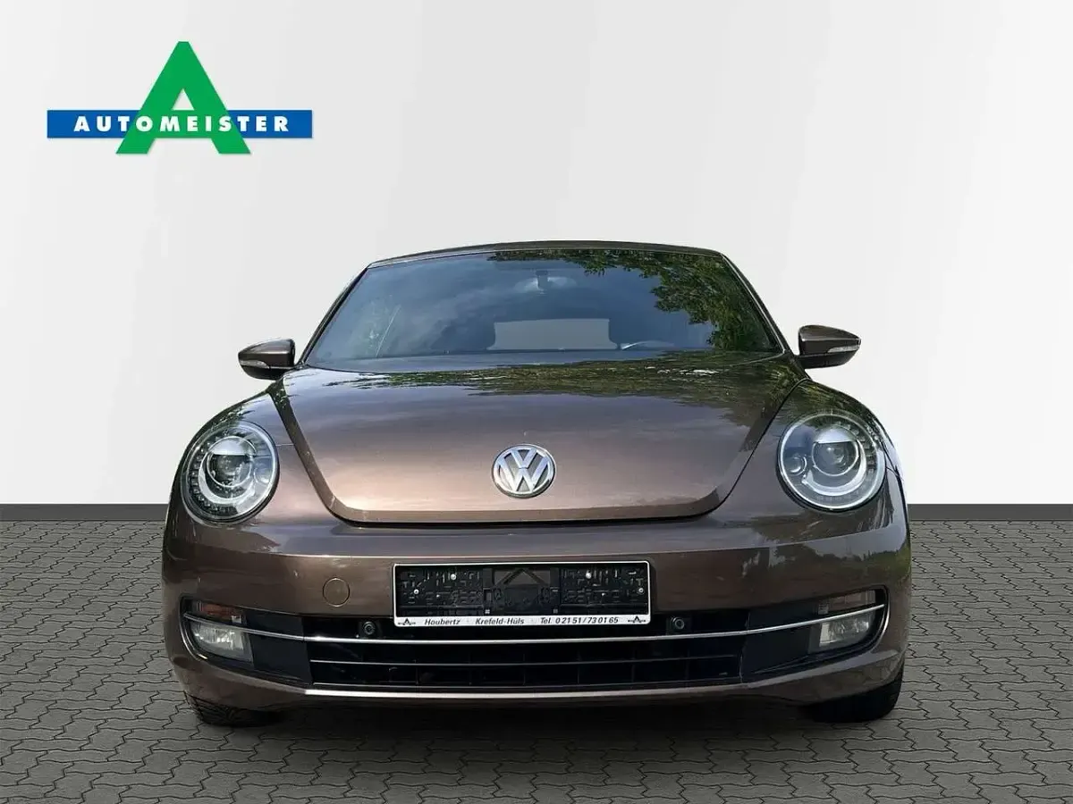 Używany VW Beetle Cabriolet Design 105 KM (77 kW) 2013 Brązowy Kabriolet