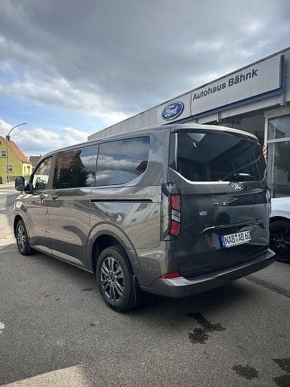 Gebraucht Ford Tourneo Custom Titanium 170 PS (125 kW) 2025 Grau Van