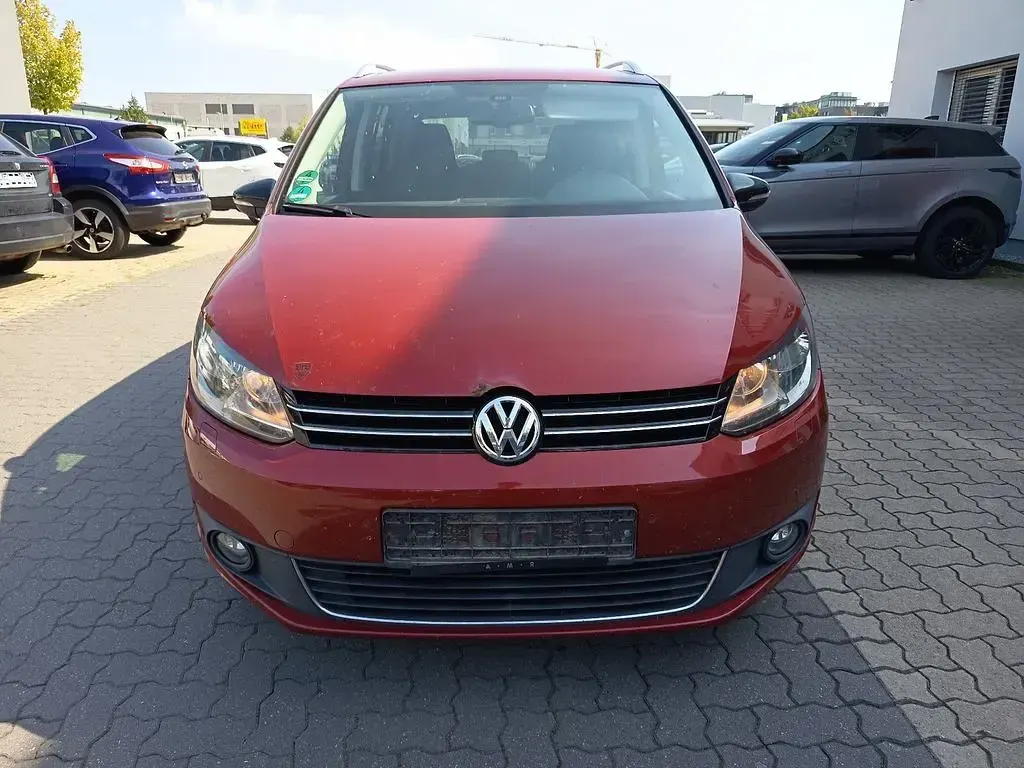 Gebraucht VW Touran Style 105 PS (77 kW) 2011 Rot Van / Kleinbus