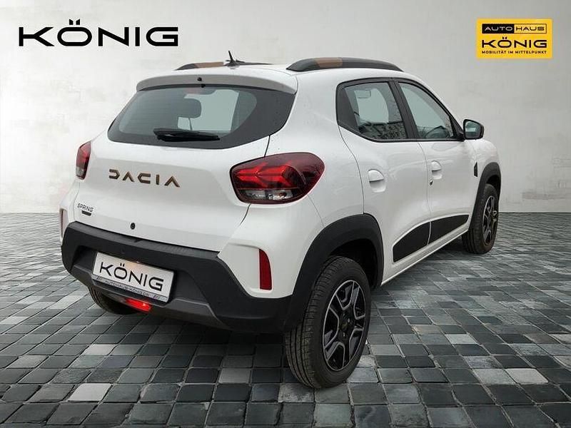 Gebraucht Dacia Spring Extreme 47 kW (65 PS) 2023 Weiß Kleinwagen