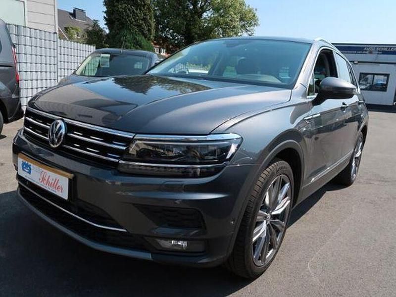 Grau Gebraucht 2018 VW Tiguan Highline SUV | 25.900 € (Fairer Preis) - Bild 1/4