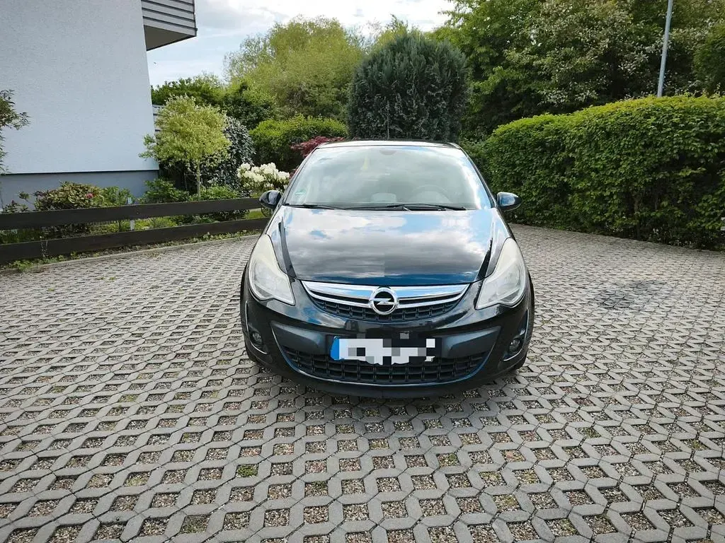 Gebraucht Opel Corsa Active 95 PS (69 kW) 2013 Schwarz Kleinwagen