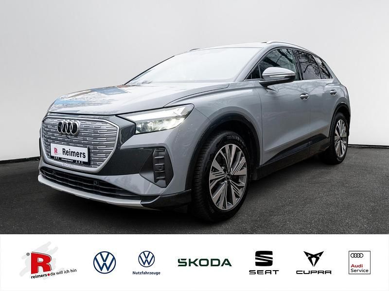 Grau Gebraucht 2021 Audi Q4 e-tron Ambiente SUV | 29.661 € (Etwas zu teuer) - Bild 1/4