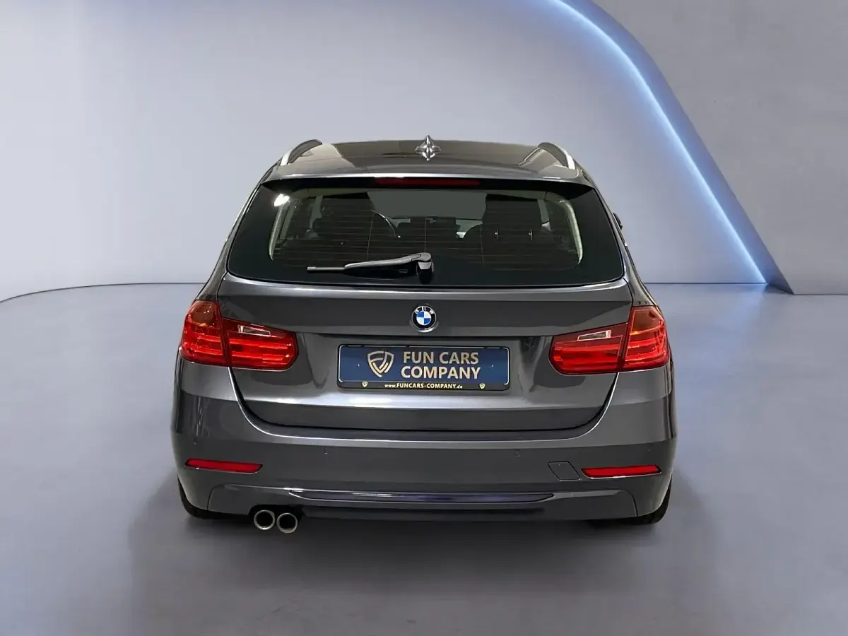 Gebraucht BMW 330 Sport Line 258 PS (189 kW) 2014 Grau Kombi