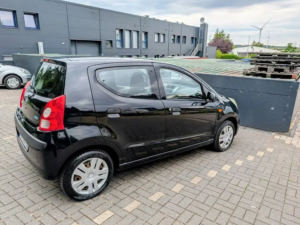 Gebraucht Nissan Pixo 68 PS (50 kW) 2009 Schwarz Kleinwagen