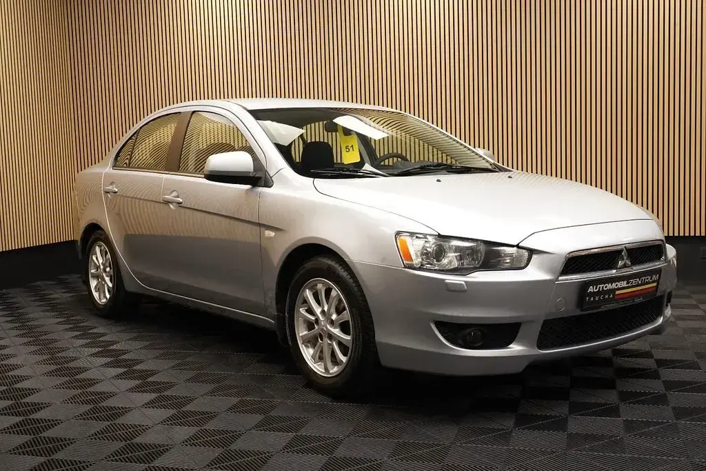 Gebraucht Mitsubishi Lancer 117 PS (86 kW) 2012 Silber Limousine