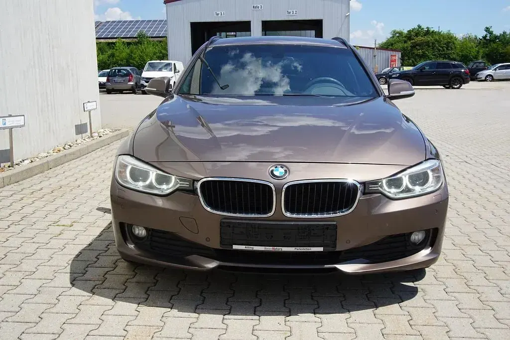Gebraucht BMW 320 Performance 184 PS (135 kW) 2013 Sparkling bronze metallic Kombi
