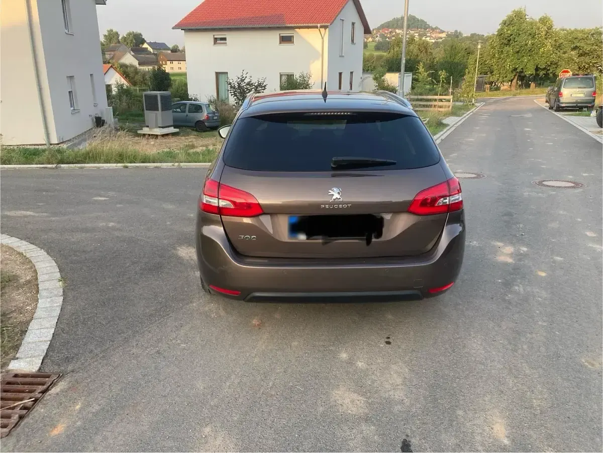 Gebraucht Peugeot 308 SW 131 PS (96 kW) 2014 Braun Kombi