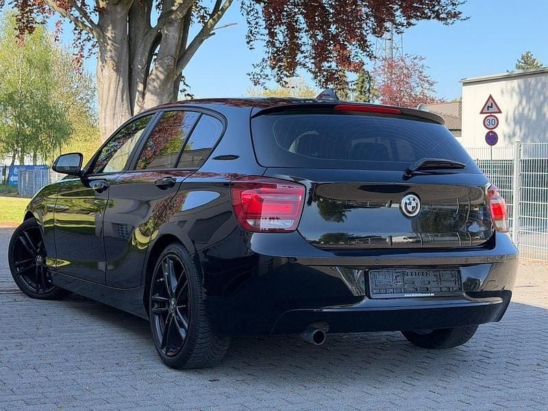 Second-hand BMW 118 Comfort Edition 143 CP (105 kW) 2014 Negru Hatchback