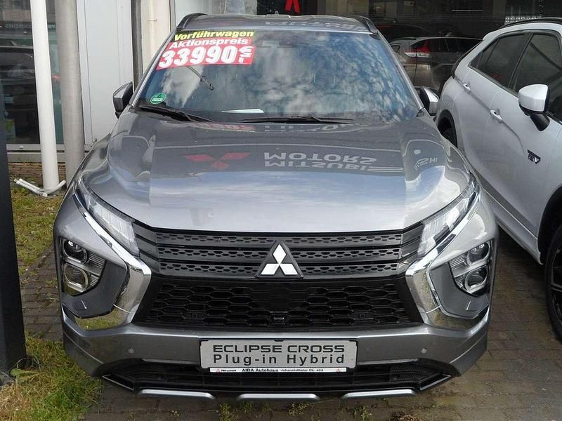 Grau Gebraucht 2023 Mitsubishi Eclipse Cross Top SUV | 34.990 € - Bild 1/1