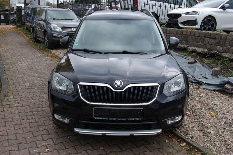 Cerna magic/black magic (metallic) Gebraucht 2015 Skoda Yeti Style SUV | 8.800 € (Superpreis) - Bild 1/4