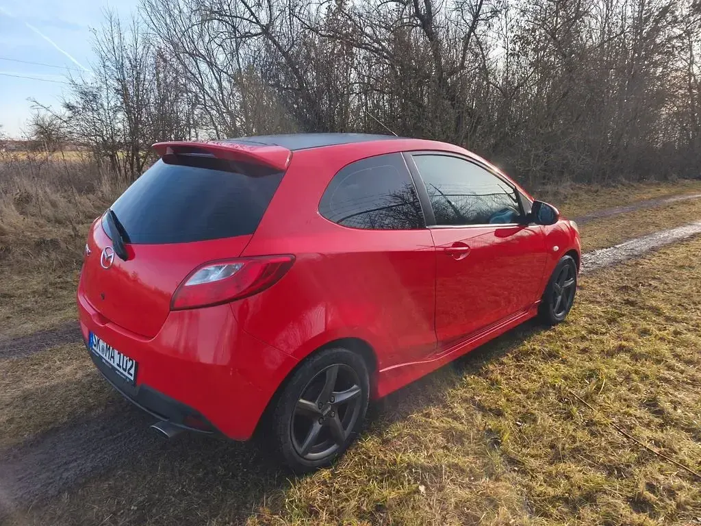 Gebraucht Mazda 2 75 PS (55 kW) 2010 Rot Kleinwagen
