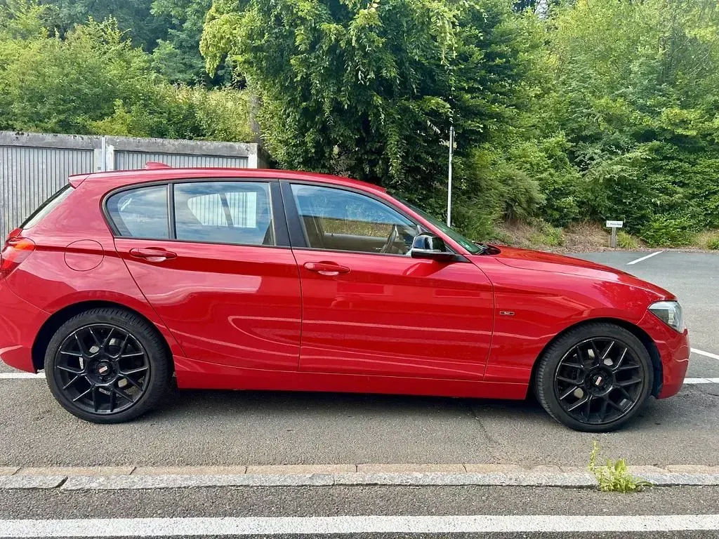 Gebraucht BMW 118 Sport Line 170 PS (125 kW) 2011 Rot Kleinwagen