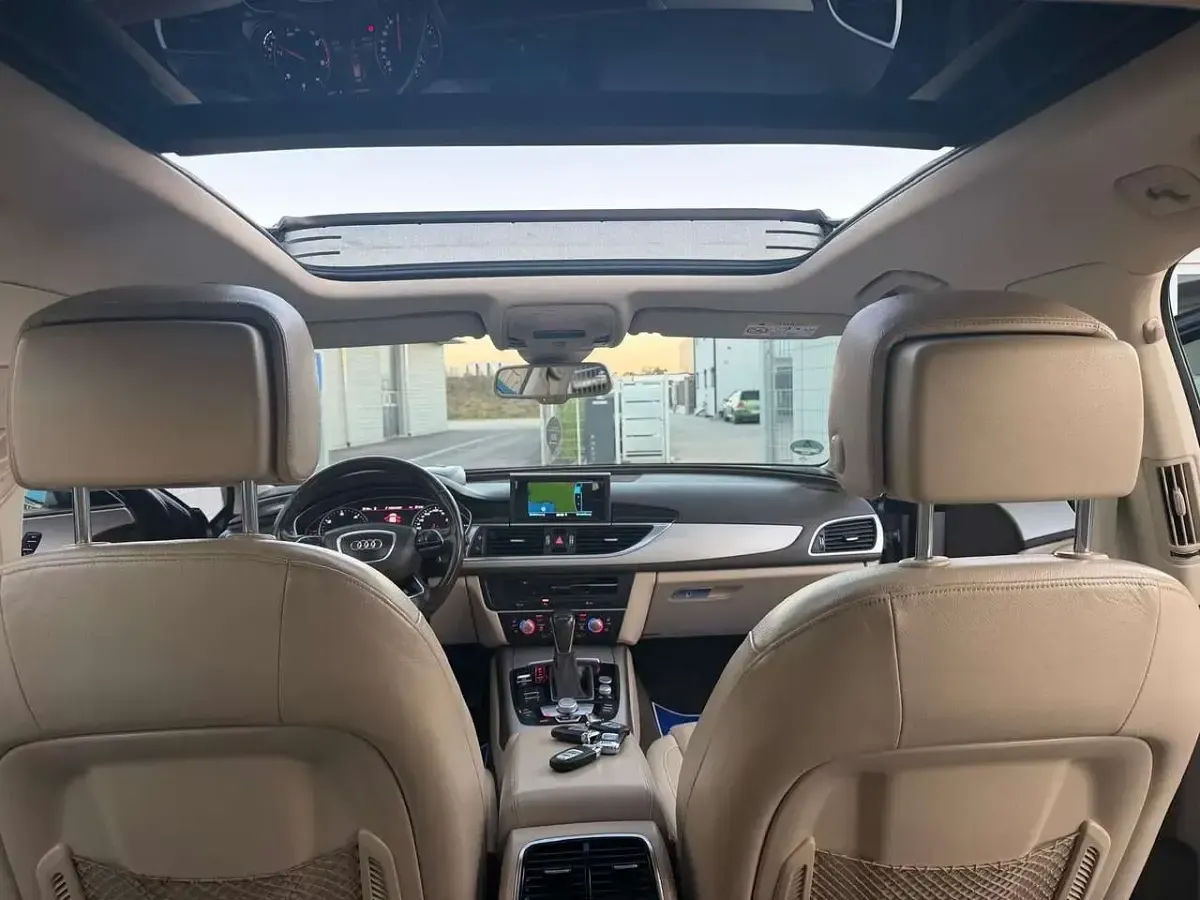 Używany Audi A6 Ambiente 218 KM (160 kW) 2015 Szary Kombi