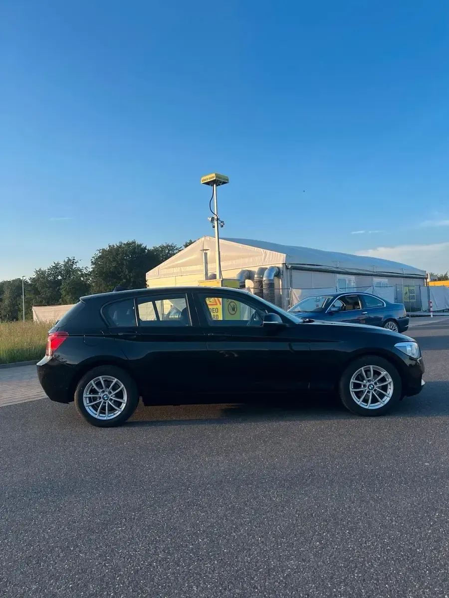 Gebraucht BMW 116 Sport Line 136 PS (100 kW) 2012 Schwarz Kleinwagen