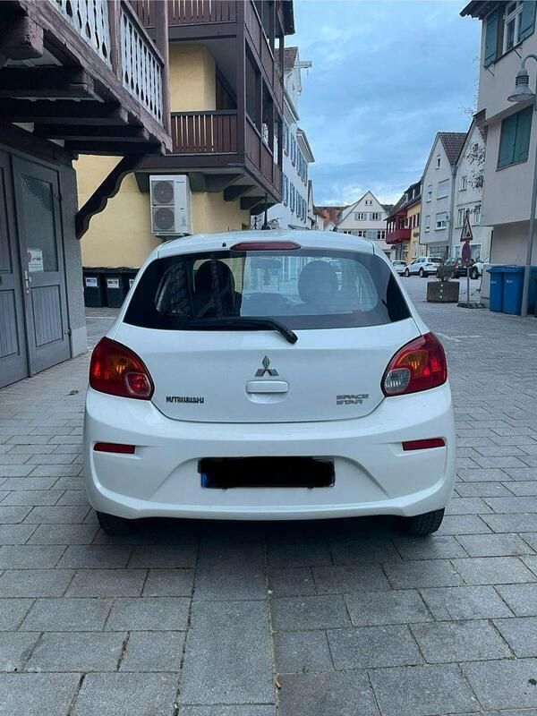 Weiß Gebraucht 2017 Mitsubishi Space Star Kleinwagen | 4.895 € (Fairer Preis) - Bild 1/4