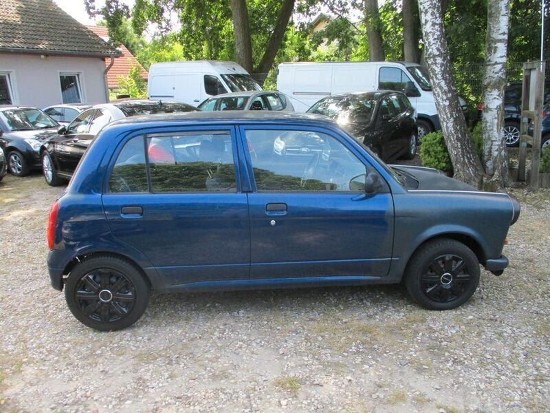 Gebraucht Daihatsu Cuore 56 PS (41 kW) 2002 Blau Kleinwagen