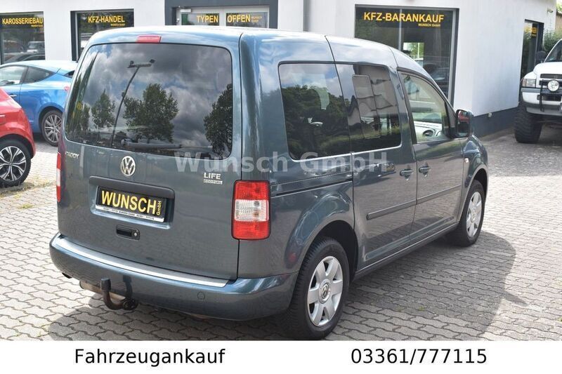 Second-hand VW Caddy Team 109 CP (80 kW) 2009 Gri Monovolum