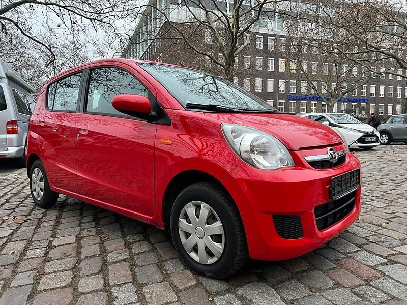 Gebraucht Daihatsu Cuore 69 PS (50 kW) 2010 Rot Kleinwagen