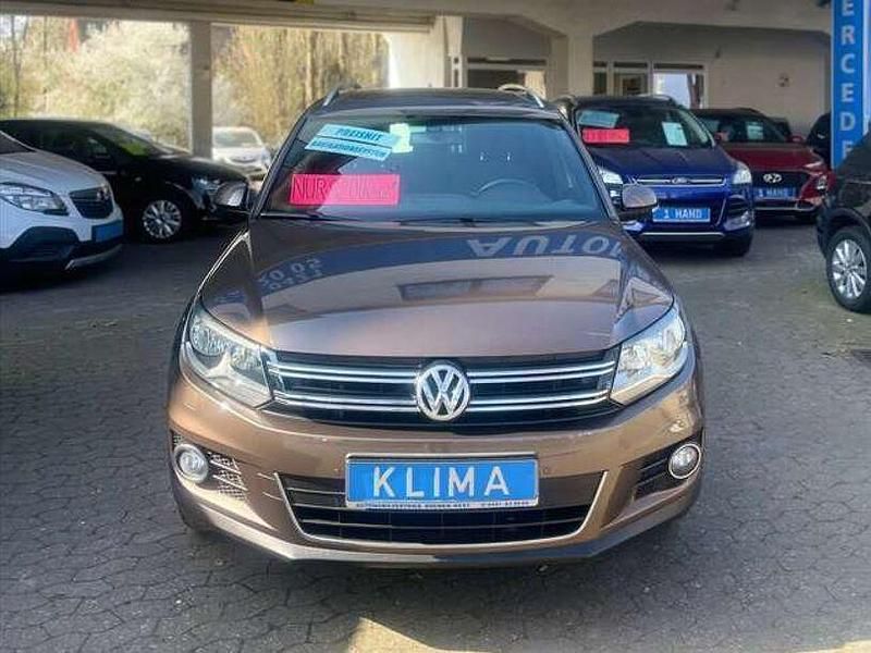 Gebraucht VW Tiguan Cup 160 PS (117 kW) 2014 Toffeebraun metallic SUV