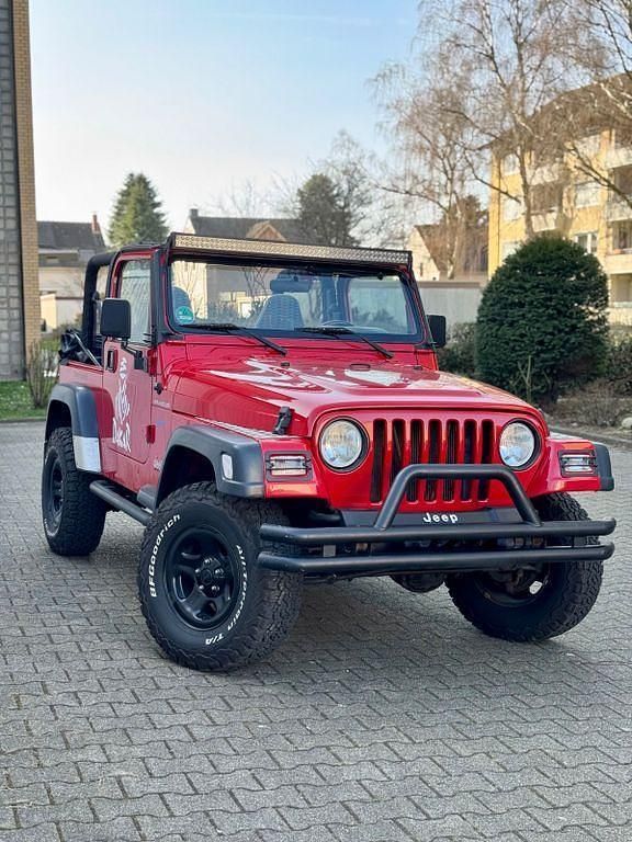 Rot Gebraucht 1997 Jeep Wrangler Sport SUV | 13.700 € (Teuer) - Bild 1/4