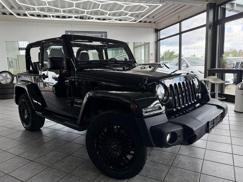 Black clear coat Gebraucht 2014 Jeep Wrangler Sahara SUV | 27.950 € (Fairer Preis) - Bild 1/4